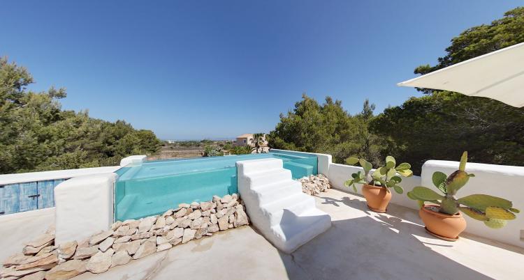 Bella villa a Formentera con piscina in vetro e vista sul mare ed Es Vedrá